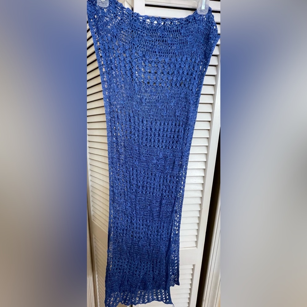 Women’s blue crocheted shawl. 80” X 20”.